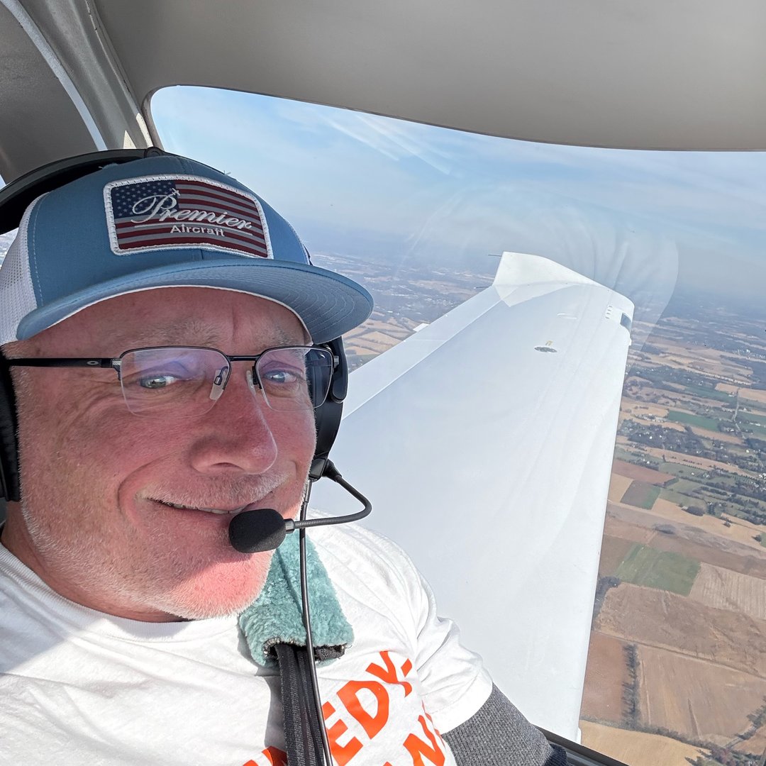 Justin McShane in the cockpit during a compassion flight mission